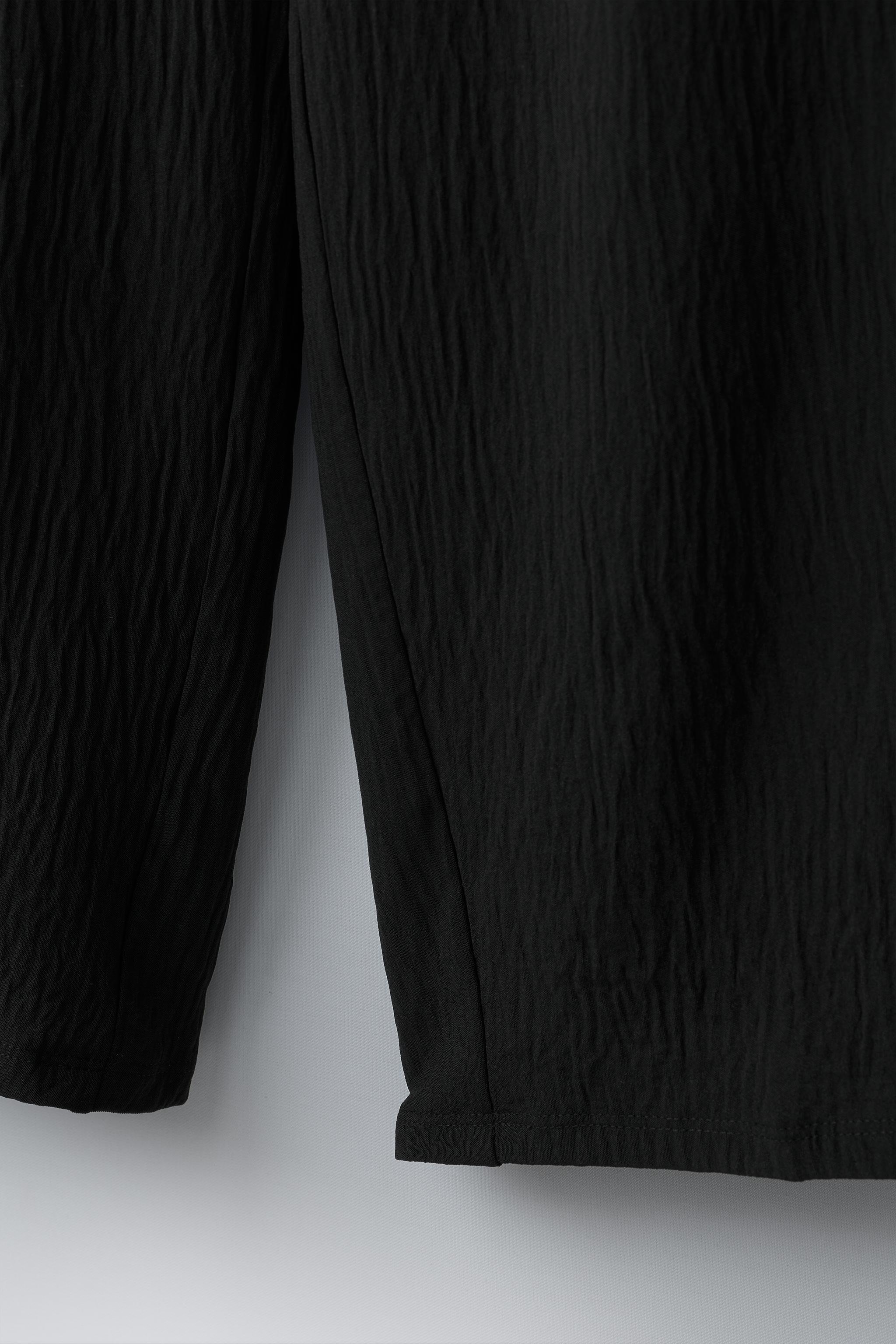 TEXTURED WIDE LEG SKIRT PANTS